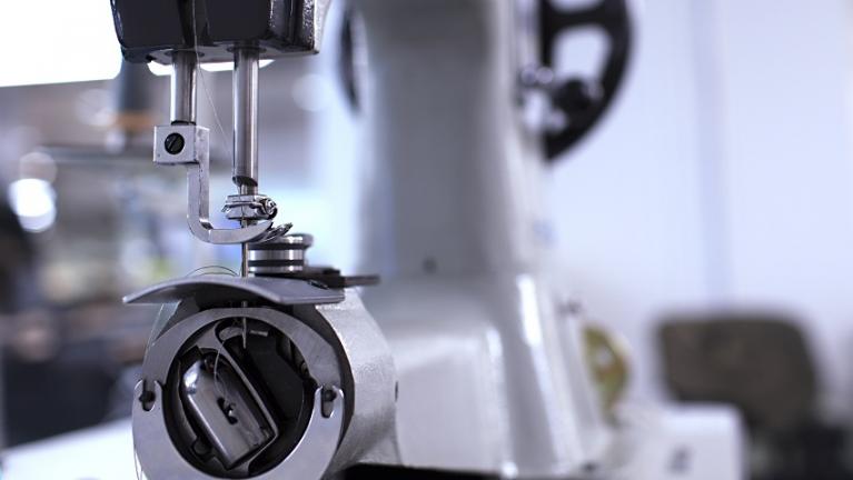 Closeup view of industrial sewing machine