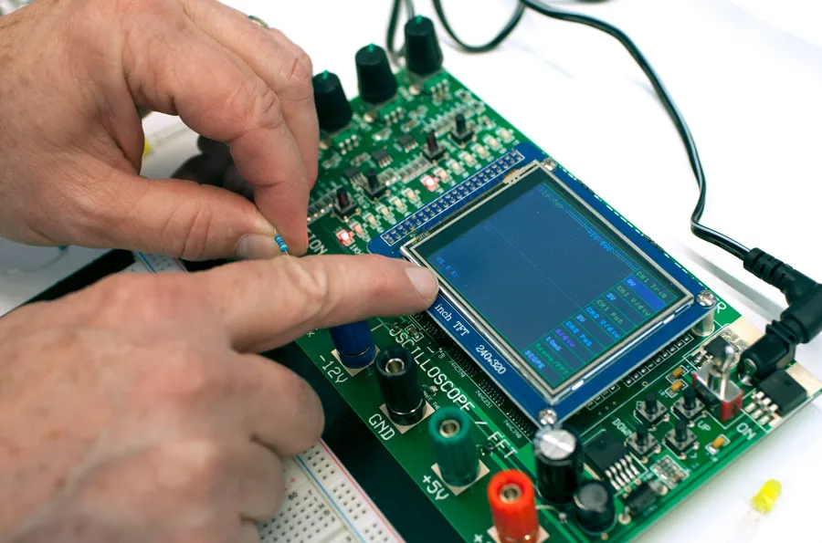 Hands and electronic circuit board